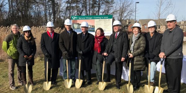 State and village officials, the developer, architect, and builder at the groundbreaking for Spruce Village in Palatine, Illinois. Pictured from left are: Carl Hauert, Project Manager, Henry Bros. Co.; Rachel Rhodes, Vice President Regional Manager, Central, National Equity Fund; Scott Britton, Cook County Board Commissioner (14th District); Richard Koenig, Executive Director, Housing Opportunity Development Corporation; Tom O’Brien, Vice President of Project Development, Henry Bros. Co., Laura Novick, Associate Architect, Cordogan Clark & Associates; John Clark, Principal, Cordogan Clark & Associates; Ann Gillespie, State Senator (27th District); Hugh Brady, Co-President of The North/Northwest Suburban Task Force On Supportive Housing for Individuals With Mental Illness; and Palatine Mayor Jim Schwantz.