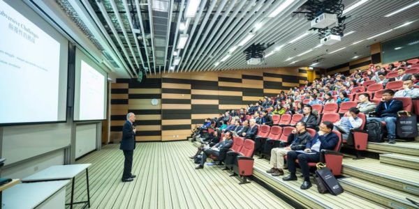 man talking to a seminar