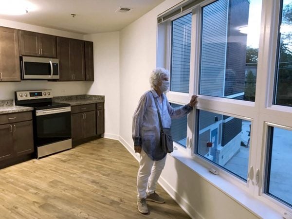 woman looking through the window