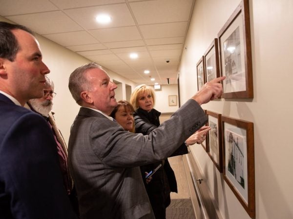 staff looking at the pictures
