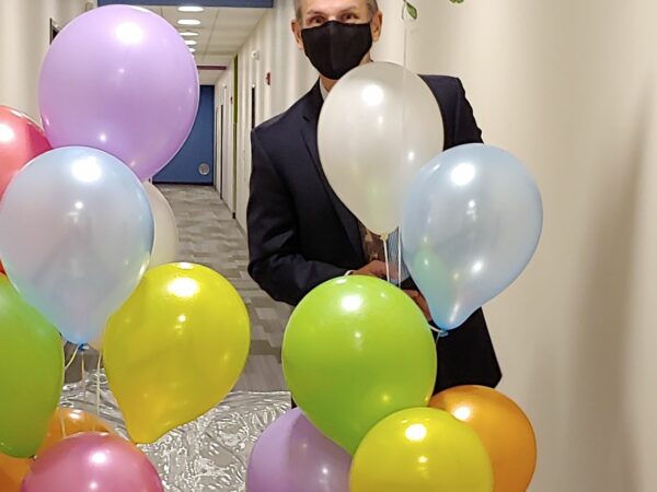 man with baloons
