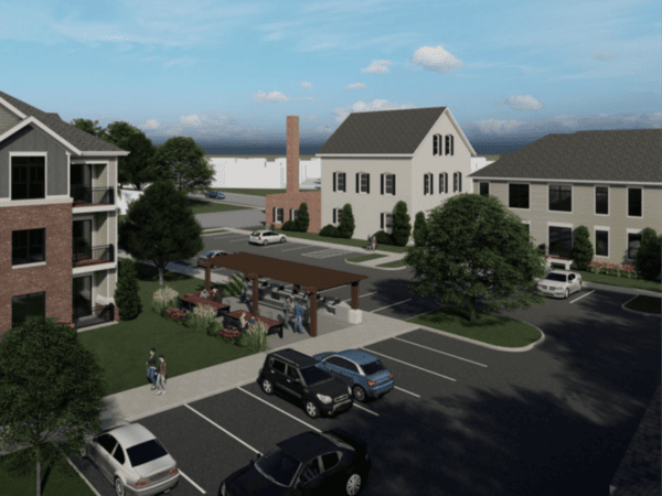 Rendering of several apartment buildings with an outdoor pavilion and parking lot.