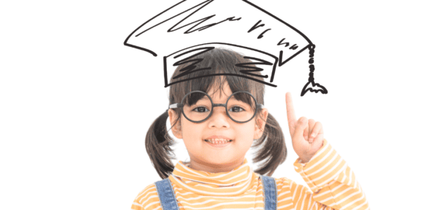 A young girl wearing a yellow shirt and jeans jumper and dark rimmed glasses flashes the #1 sign. A graduation cap is illustrated over her head. "Affordable Housing and Educational Success"