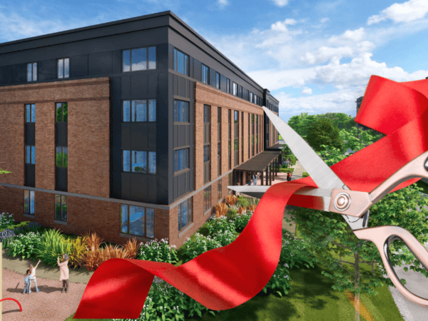 Rendering of a four-story apartment building with a graphic of a red ribbon being cut by scissors in front of it.